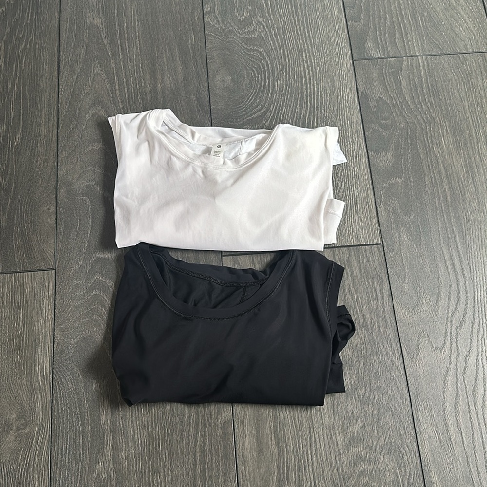 Two Lululemon open back tanks size 8